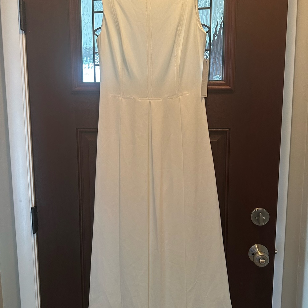 Calvin Klein Ivory Sleeveless Lined Dress for any special occasion. NWT